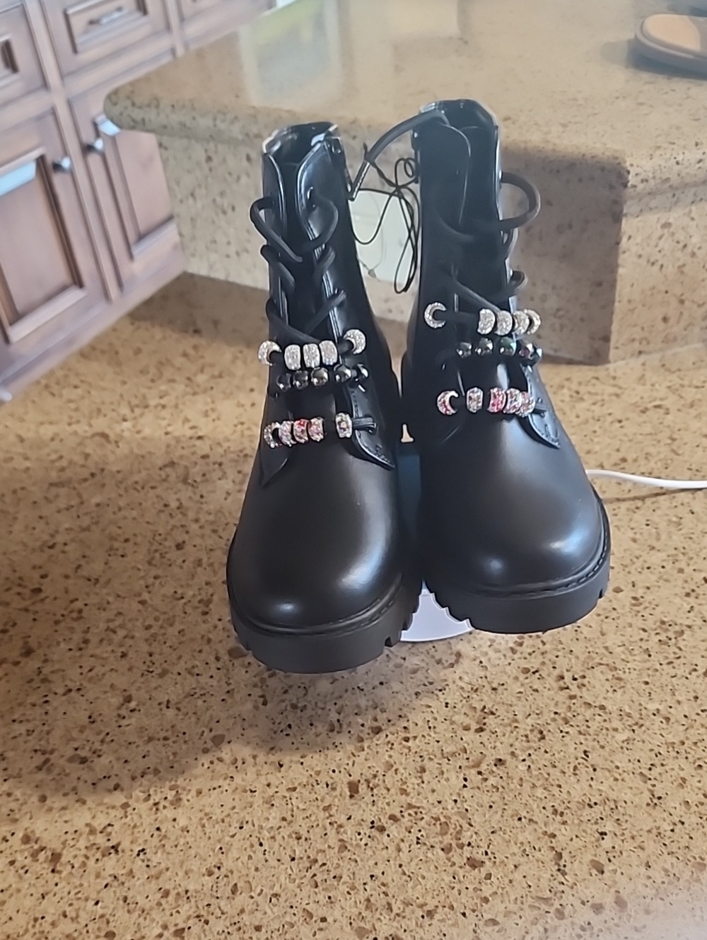 NWT SIZE-2 KIDS BLACK COMBAT BOOTS WITH DECORATIVE BEAD ACCENTS.